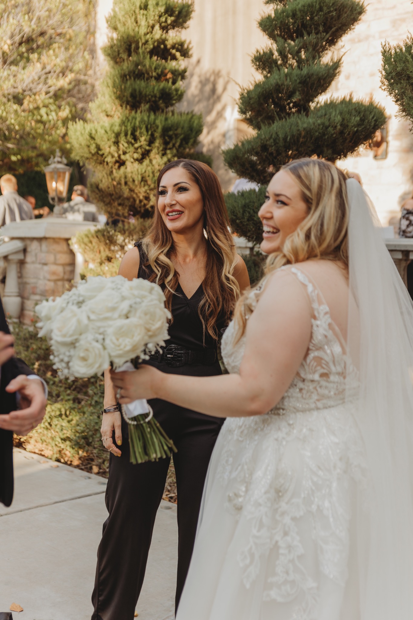Selin with a bride during a wedding celebration